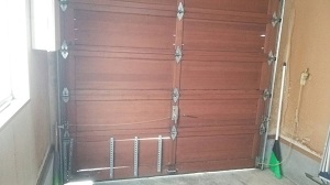 石狩市樽川　既存木製～輸入電動スチールドアに変更です。お洒落です