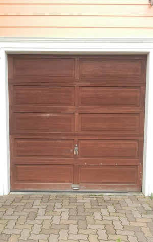 石狩市樽川　既存木製～輸入電動スチールドアに変更です。お洒落です