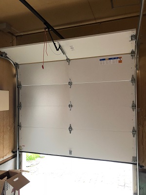 石狩市樽川　既存木製～輸入電動スチールドアに変更です。お洒落です