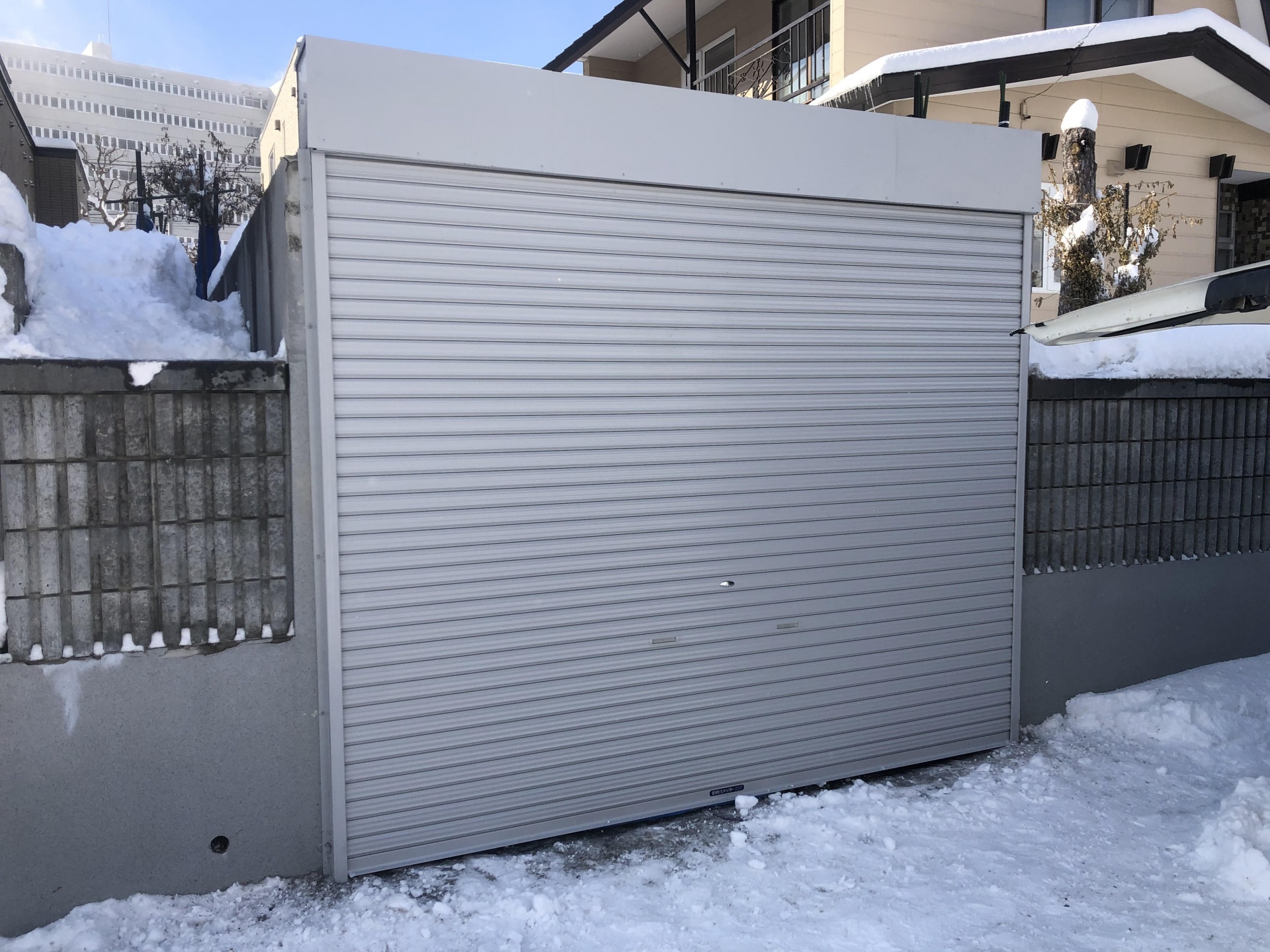 札幌市厚別区でガレージかさ上げ工事(ハツリ工事＋シャッター交換)